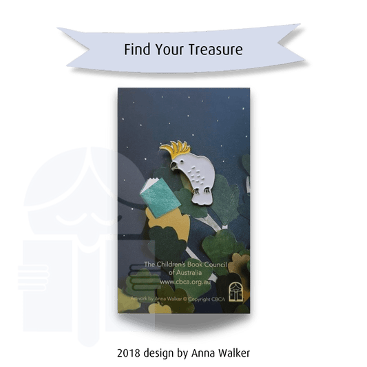 A picture of a small sulphur crested cockatoo brooch. Text on a graphic flag reads "Find your treasure. 2018 design by Anna Walker."
