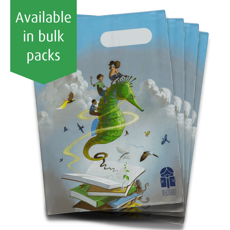 four exercise books covers fanned with text that reads "available in bulk packs"