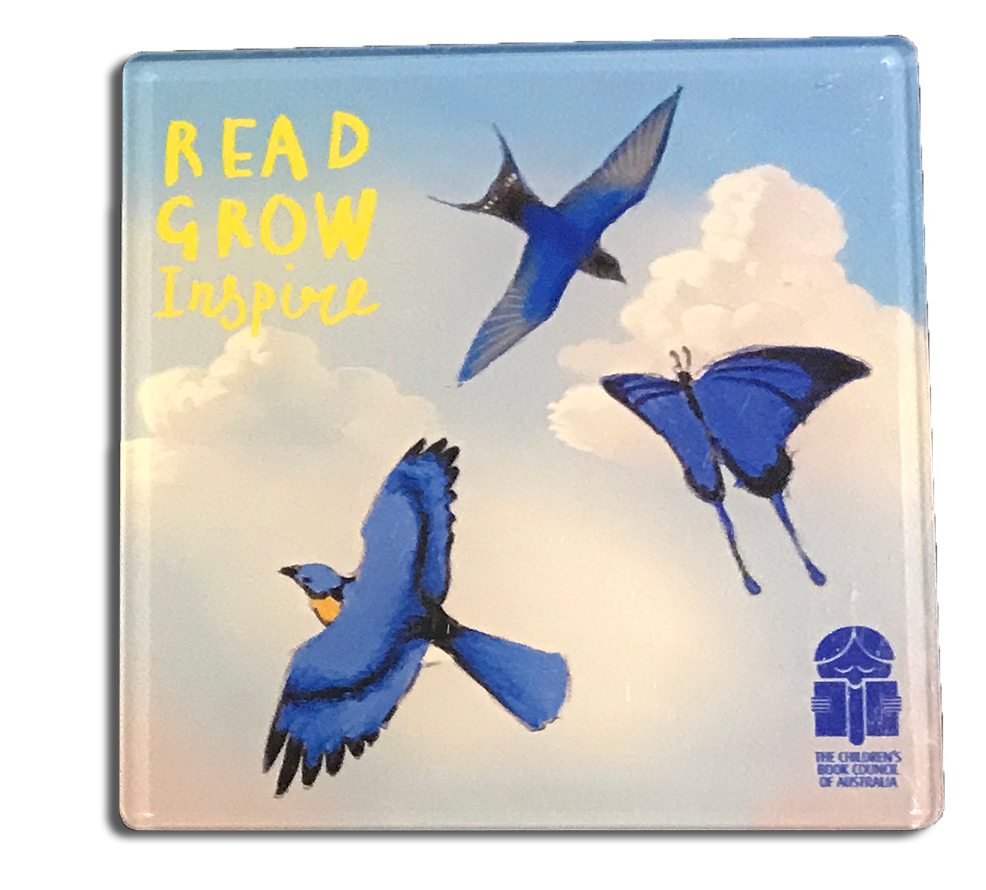 a cup coaster with the image of three blue birds flying in a cloud filled sky